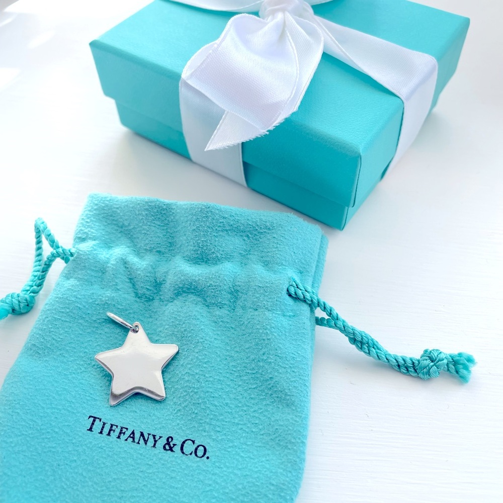 Tiffany & Company Sterling Silver small star charm.